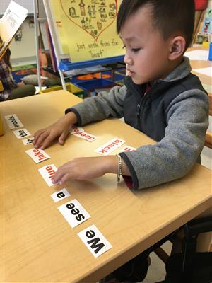 K/1-114x Practicing writing 